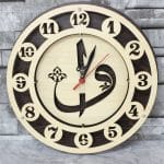 ساعة حائط حرف الواو والألف