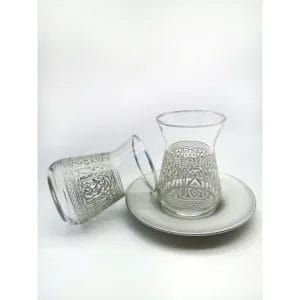 Set of Turkish tea:Transparent with silver motifs and a silver rim plate.