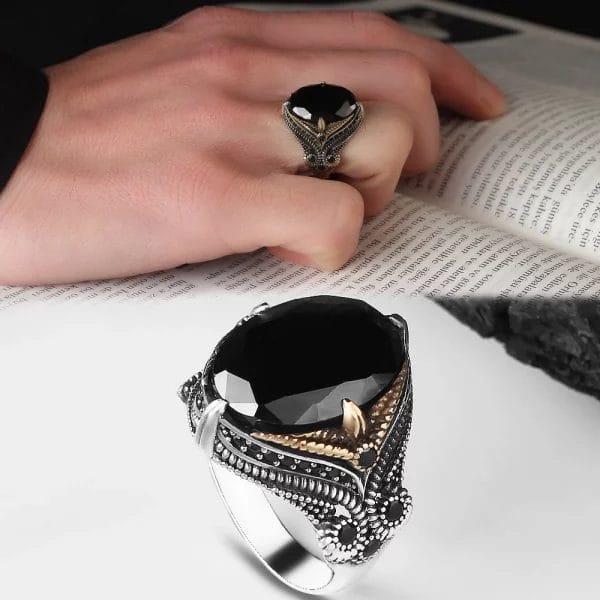 A men's silver ring, 925 sterling silver, with a black zircon stone