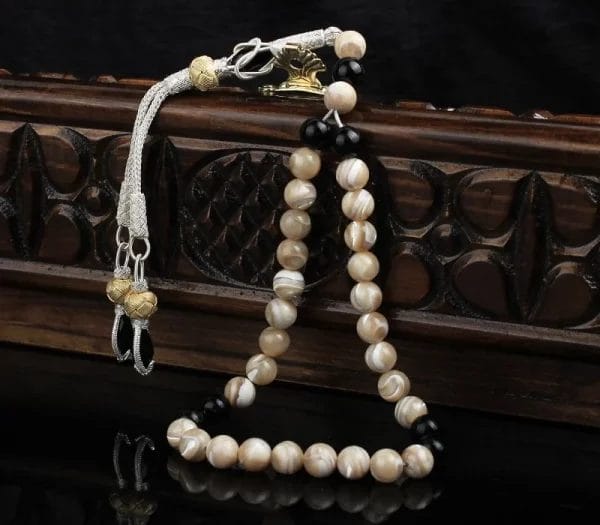 A rosary made of Kazaz, crafted from pearls and black agate stone