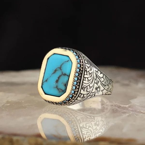 A men's ring embellished with a turquoise stone in sterling silver, 925 carats
