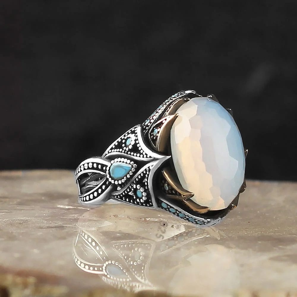 Men's sterling silver ring with a 925 purity featuring a white moonstone