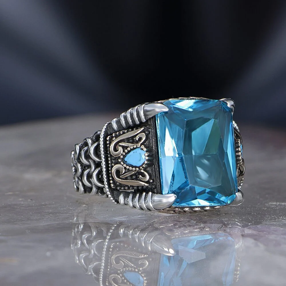Men's sterling silver ring with a blue topaz stone, 925 purity