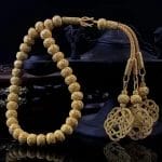 سبحة قزازية مصنوعة يدويًا من الفضة عيار 1000 مطلية بالذهب