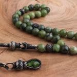 سبحة فضة مزينة بشرابة فضة وحجر ياشم الكندي